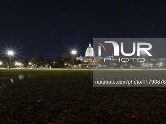 Night view of the illuminated US Capitol, the seat of the United States Congress with the United States Senate and the US House of Represent...