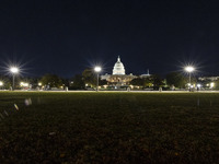 Night view of the illuminated US Capitol, the seat of the United States Congress with the United States Senate and the US House of Represent...