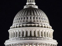 Night view of the illuminated US Capitol, the seat of the United States Congress with the United States Senate and the US House of Represent...