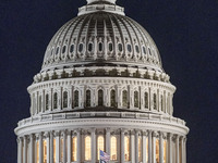 Night view of the illuminated US Capitol, the seat of the United States Congress with the United States Senate and the US House of Represent...