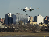 Frontier Airlines Airbus A320neo passenger aircraft spotted on final approach flying, landing and taxiing on the runway and taxiway of LaGua...