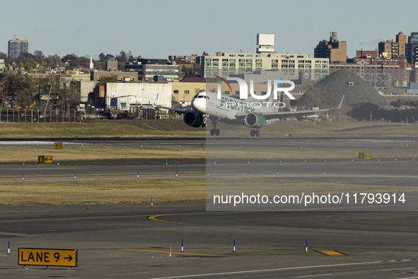 Frontier Airlines Airbus A320neo passenger aircraft spotted on final approach flying, landing and taxiing on the runway and taxiway of LaGua...