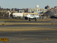 Frontier Airlines Airbus A320neo passenger aircraft spotted on final approach flying, landing and taxiing on the runway and taxiway of LaGua...