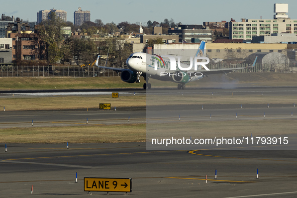 Frontier Airlines Airbus A320neo passenger aircraft spotted on final approach flying, landing and taxiing on the runway and taxiway of LaGua...