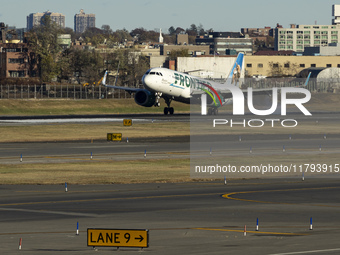 Frontier Airlines Airbus A320neo passenger aircraft spotted on final approach flying, landing and taxiing on the runway and taxiway of LaGua...