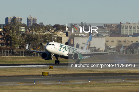 Frontier Airlines Airbus A320neo passenger aircraft spotted on final approach flying, landing and taxiing on the runway and taxiway of LaGua...