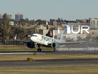 Frontier Airlines Airbus A320neo passenger aircraft spotted on final approach flying, landing and taxiing on the runway and taxiway of LaGua...