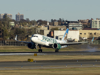 Frontier Airlines Airbus A320neo passenger aircraft spotted on final approach flying, landing and taxiing on the runway and taxiway of LaGua...