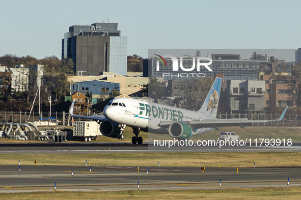 Frontier Airlines Airbus A320neo passenger aircraft spotted on final approach flying, landing and taxiing on the runway and taxiway of LaGua...