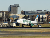 Frontier Airlines Airbus A320neo passenger aircraft spotted on final approach flying, landing and taxiing on the runway and taxiway of LaGua...