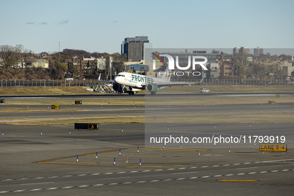 Frontier Airlines Airbus A320neo passenger aircraft spotted on final approach flying, landing and taxiing on the runway and taxiway of LaGua...