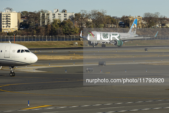 Frontier Airlines Airbus A320neo passenger aircraft spotted on final approach flying, landing and taxiing on the runway and taxiway of LaGua...