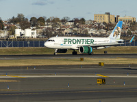 Frontier Airlines Airbus A320neo passenger aircraft spotted on final approach flying, landing and taxiing on the runway and taxiway of LaGua...