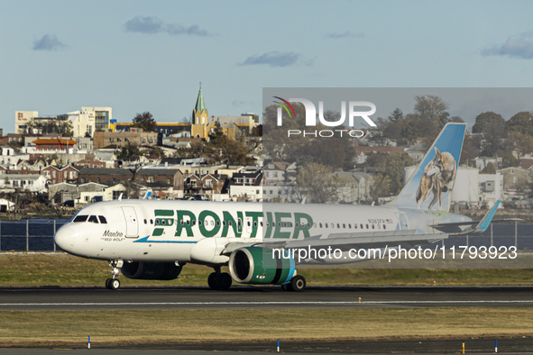 Frontier Airlines Airbus A320neo passenger aircraft spotted on final approach flying, landing and taxiing on the runway and taxiway of LaGua...