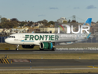 Frontier Airlines Airbus A320neo passenger aircraft spotted on final approach flying, landing and taxiing on the runway and taxiway of LaGua...