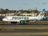 Frontier Airlines Airbus A320neo passenger aircraft spotted on final approach flying, landing and taxiing on the runway and taxiway of LaGua...