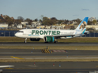 Frontier Airlines Airbus A320neo passenger aircraft spotted on final approach flying, landing and taxiing on the runway and taxiway of LaGua...