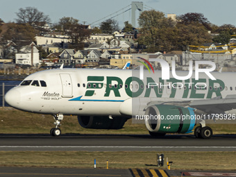 Frontier Airlines Airbus A320neo passenger aircraft spotted on final approach flying, landing and taxiing on the runway and taxiway of LaGua...