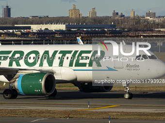 Frontier Airlines Airbus A320neo passenger aircraft spotted on final approach flying, landing and taxiing on the runway and taxiway of LaGua...