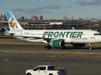 Frontier Airlines Airbus A320neo passenger aircraft spotted on final approach flying, landing and taxiing on the runway and taxiway of LaGua...