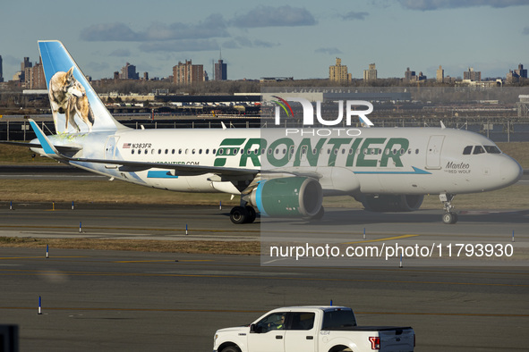 Frontier Airlines Airbus A320neo passenger aircraft spotted on final approach flying, landing and taxiing on the runway and taxiway of LaGua...