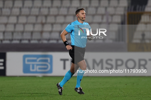 In Ta' Qali, Malta, on November 19, 2024, UEFA appoints match referee Luka Bilbija, who runs during the UEFA Nations League, League D, Group...