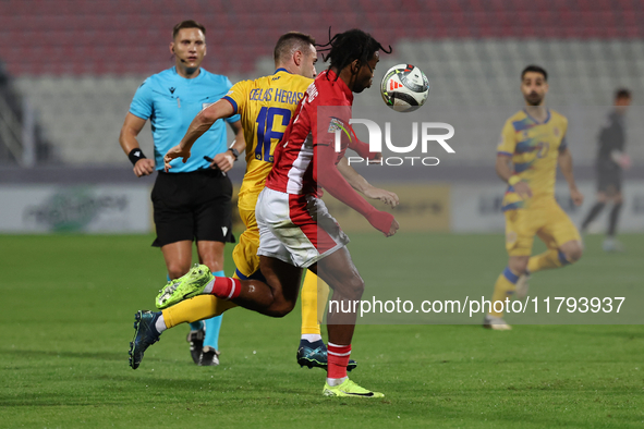 Eric De las Heras of Andorra competes for the ball with Paul Mbong of Malta during the UEFA Nations League, League D, Group D2 soccer match...