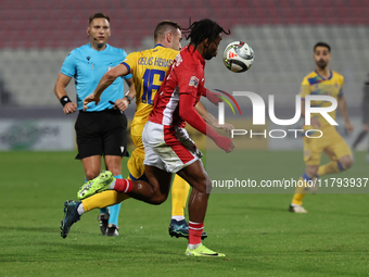 Eric De las Heras of Andorra competes for the ball with Paul Mbong of Malta during the UEFA Nations League, League D, Group D2 soccer match...