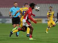 Eric De las Heras of Andorra competes for the ball with Paul Mbong of Malta during the UEFA Nations League, League D, Group D2 soccer match...