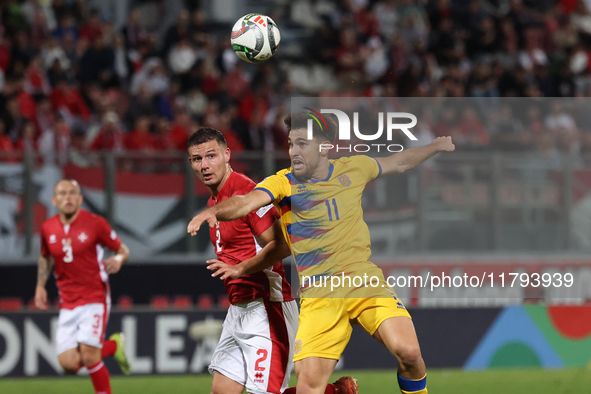 Albert Rosas of Andorra challenges Jean Borg of Malta for possession of the ball during the UEFA Nations League, League D, Group D2 soccer m...