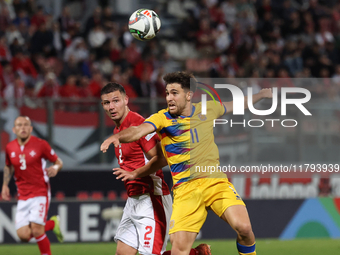 Albert Rosas of Andorra challenges Jean Borg of Malta for possession of the ball during the UEFA Nations League, League D, Group D2 soccer m...