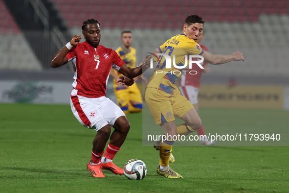 Joseph Mbong of Malta competes for the ball with Joao Da Silva of Andorra during the UEFA Nations League, League D, Group D2 soccer match be...