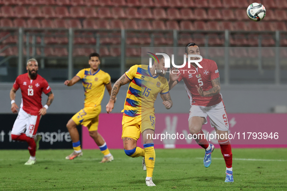 Moises San Nicolas of Andorra competes for the ball with Kurt Shaw of Malta during the UEFA Nations League, League D, Group D2 soccer match...