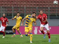 Moises San Nicolas of Andorra competes for the ball with Kurt Shaw of Malta during the UEFA Nations League, League D, Group D2 soccer match...