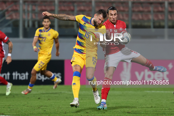 Moises San Nicolas of Andorra competes for the ball with Kurt Shaw of Malta during the UEFA Nations League, League D, Group D2 soccer match...