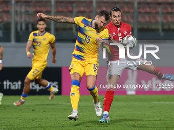 Moises San Nicolas of Andorra competes for the ball with Kurt Shaw of Malta during the UEFA Nations League, League D, Group D2 soccer match...