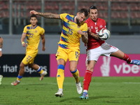 Moises San Nicolas of Andorra competes for the ball with Kurt Shaw of Malta during the UEFA Nations League, League D, Group D2 soccer match...