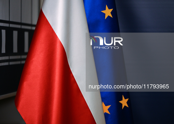 WARSAW, POLAND - NOVEMBER 19:   
European Union and Polish Flags Displayed During Sikorski's Press Briefing on EU Big Five and UK Talks, on...