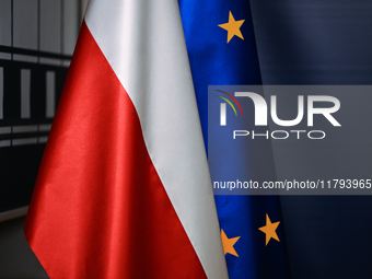 WARSAW, POLAND - NOVEMBER 19:   
European Union and Polish Flags Displayed During Sikorski's Press Briefing on EU Big Five and UK Talks, on...