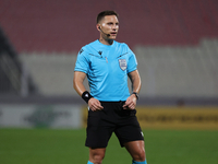 UEFA appoints match referee Luka Bilbija, who gestures during the UEFA Nations League, League D, Group D2 soccer match between Malta and And...