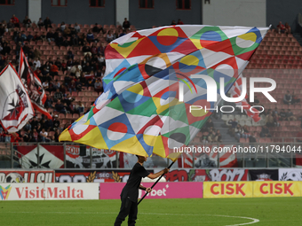 A flag bearer holds the UEFA National League flag before the UEFA Nations League, League D, Group D2 soccer match between Malta and Andorra...