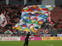 A flag bearer holds the UEFA National League flag before the UEFA Nations League, League D, Group D2 soccer match between Malta and Andorra...