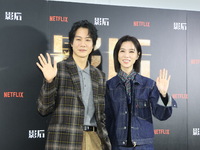 Actress Ying-Hsuan Hsieh and actor Xue Shiling pose at a promotional event in Taipei, Taiwan province, China, on November 19, 2024. (