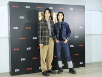 Actress Ying-Hsuan Hsieh and actor Xue Shiling pose at a promotional event in Taipei, Taiwan province, China, on November 19, 2024. (