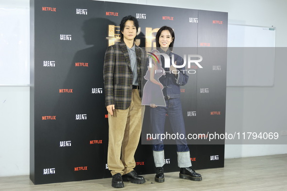 Actress Ying-Hsuan Hsieh and actor Xue Shiling pose at a promotional event in Taipei, Taiwan province, China, on November 19, 2024. 