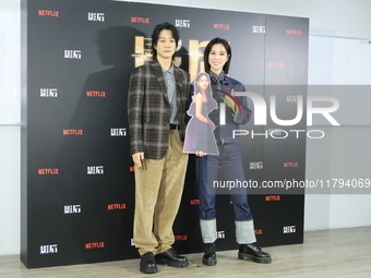 Actress Ying-Hsuan Hsieh and actor Xue Shiling pose at a promotional event in Taipei, Taiwan province, China, on November 19, 2024. (