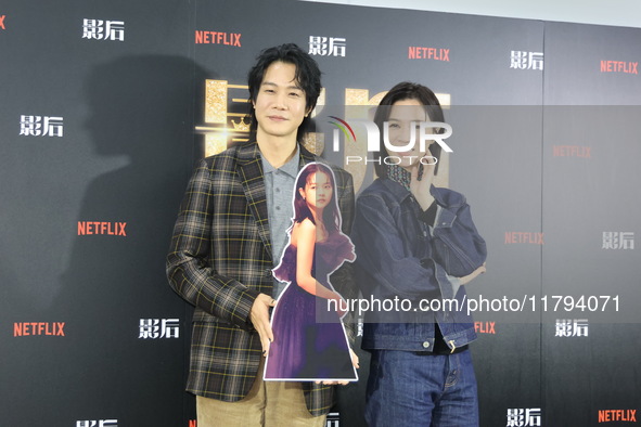 Actress Ying-Hsuan Hsieh and actor Xue Shiling pose at a promotional event in Taipei, Taiwan province, China, on November 19, 2024. 