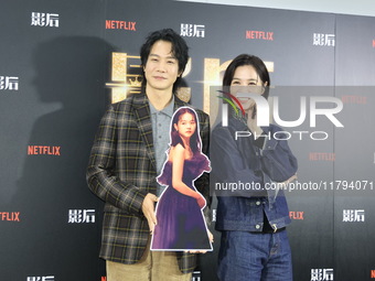 Actress Ying-Hsuan Hsieh and actor Xue Shiling pose at a promotional event in Taipei, Taiwan province, China, on November 19, 2024. (