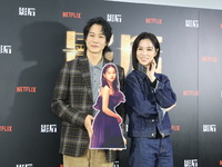 Actress Ying-Hsuan Hsieh and actor Xue Shiling pose at a promotional event in Taipei, Taiwan province, China, on November 19, 2024. (