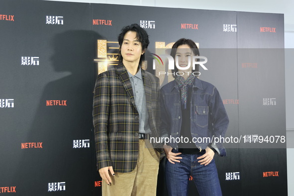 Actress Ying-Hsuan Hsieh and actor Xue Shiling pose at a promotional event in Taipei, Taiwan province, China, on November 19, 2024. 